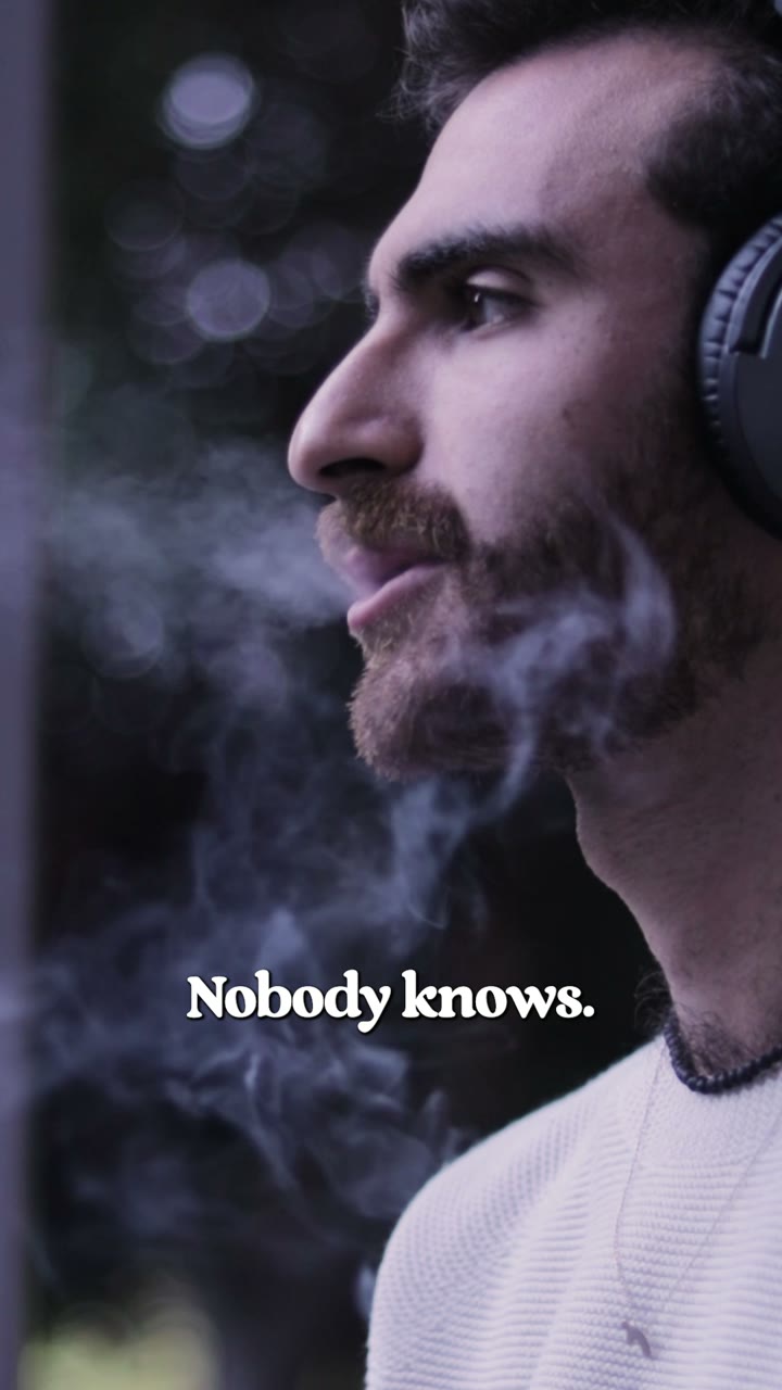 Man in headphones exhaling smoke, caption: Nobody knows.